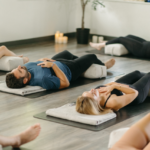 Corporate yoga session in Toronto Team practicing mindfulness and relaxation at OHA Wellness studio in Liberty Village